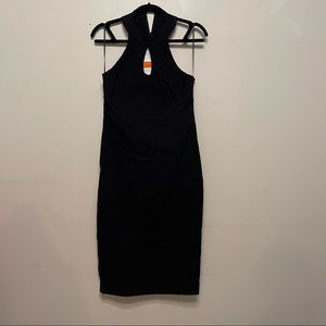 Black midi dress. With center cleavage